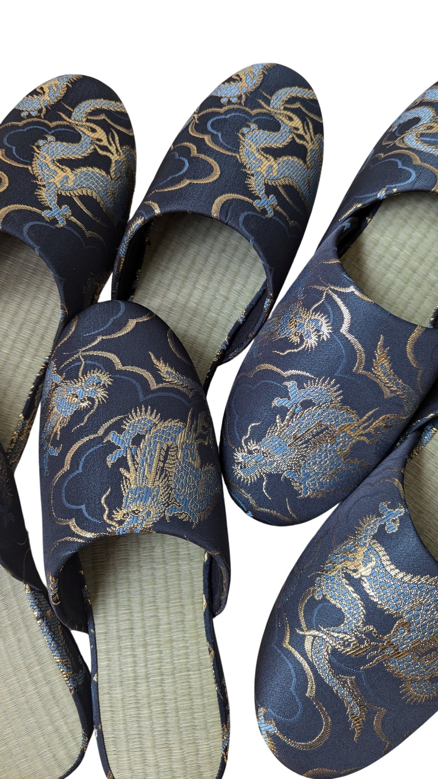 These slippers are made with fabric depicting dragons.