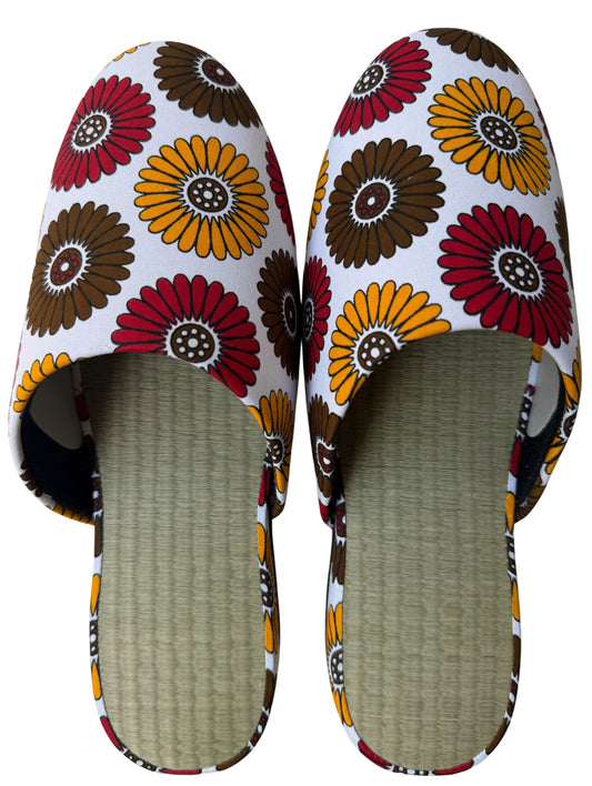 Pair of slippers with colorful floral pattern